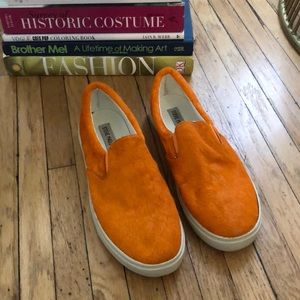 Bright Orange Steve Madden slip-ons